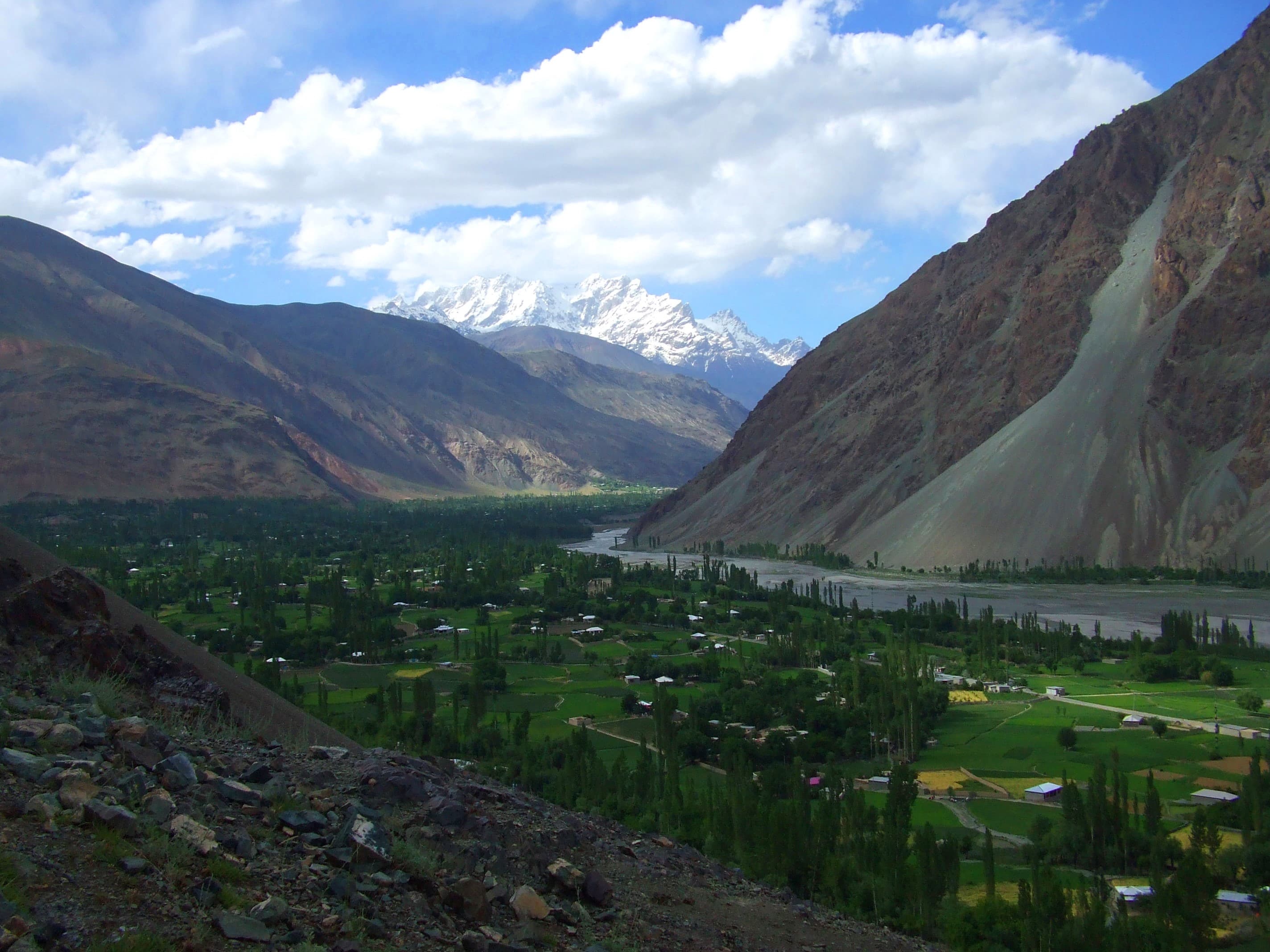 Yasin Valley's terraced fields and villages beneath Hindu Kush peaks
