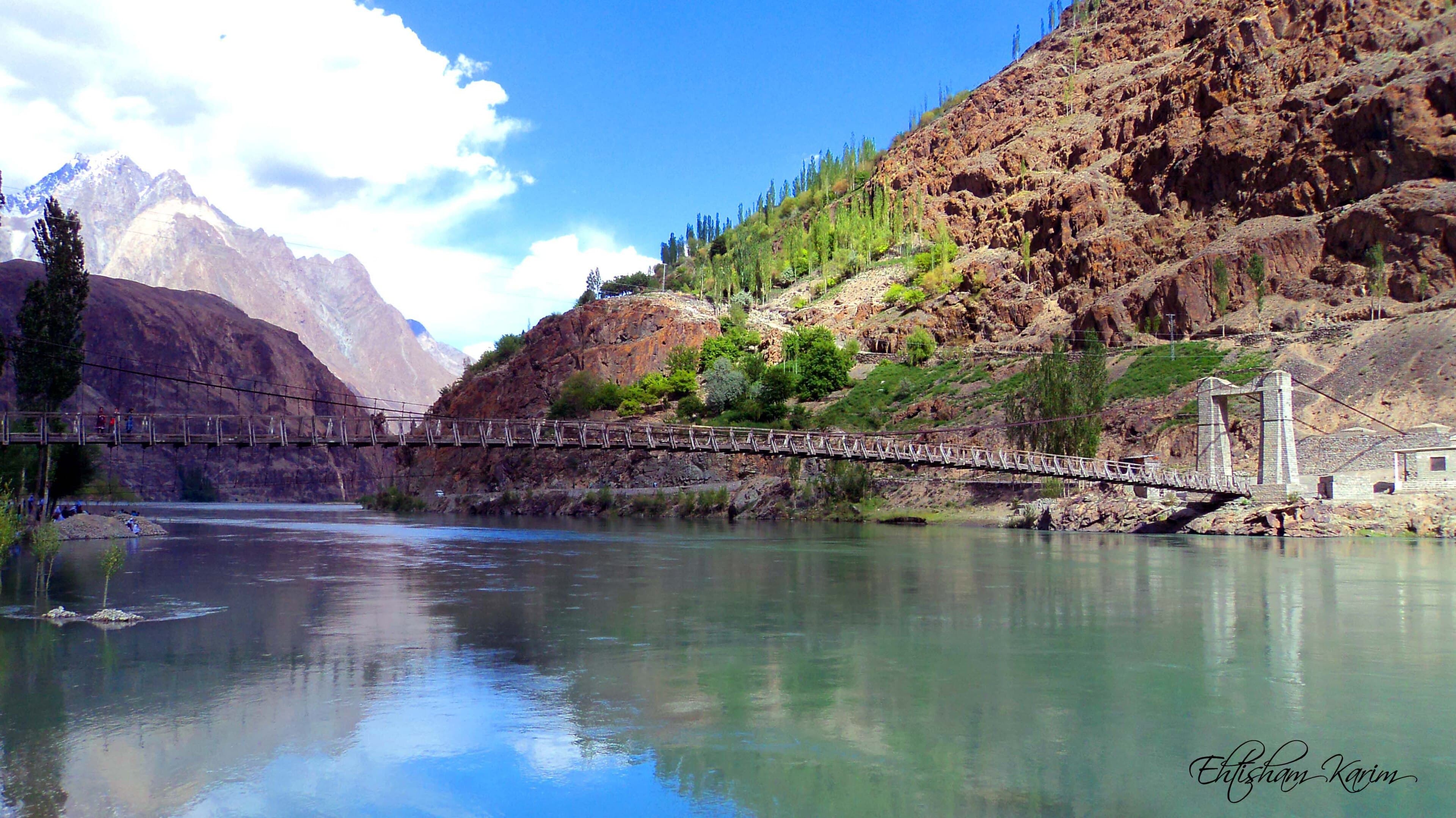 Gupis town and green fields along the Ghizer River on the Gilgit-Chitral road