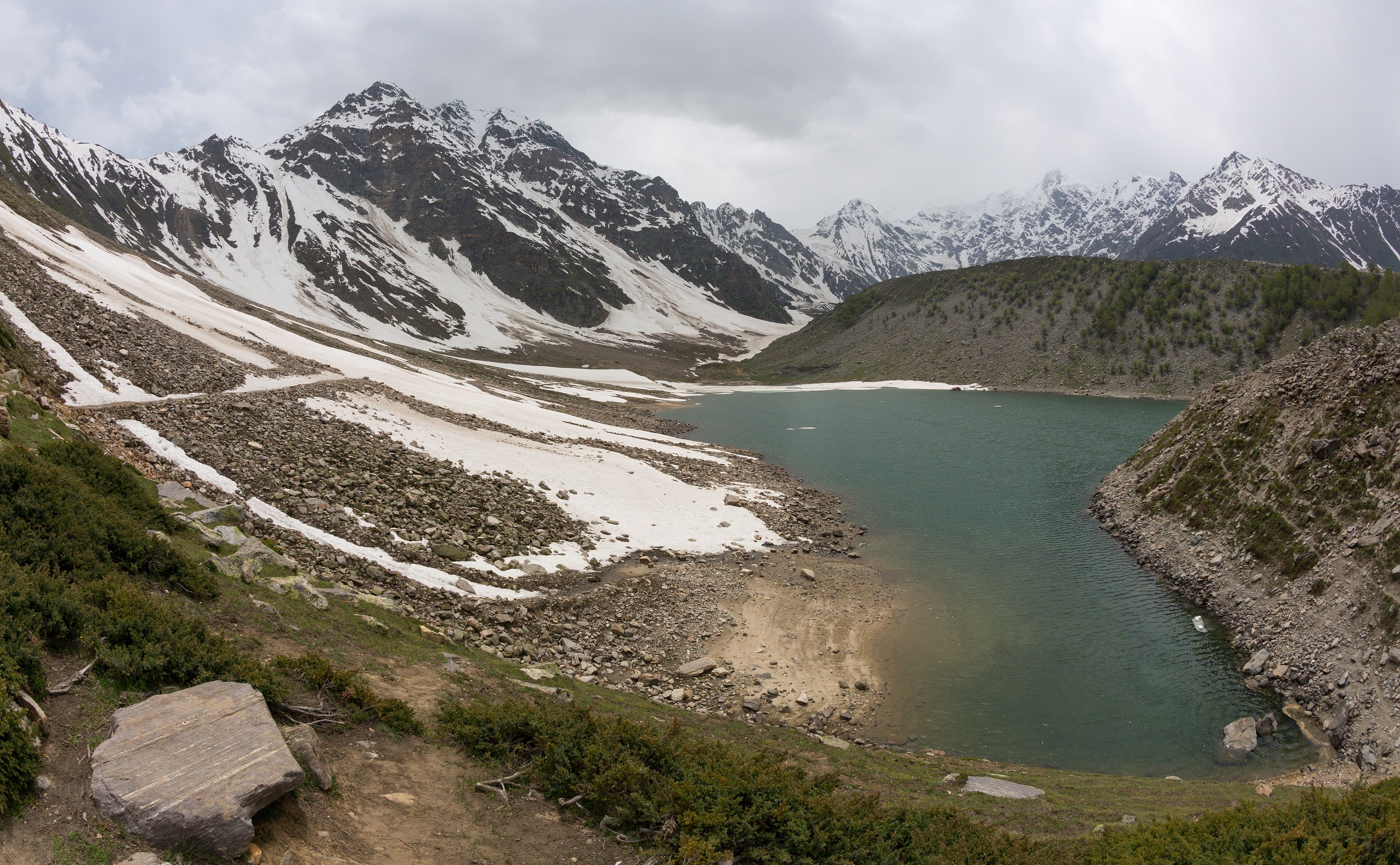 Rama Lake with the snow-covered Chongra peaks of Nanga Parbat behind